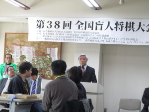 開会の挨拶をする名視協・橋井会長の写真
